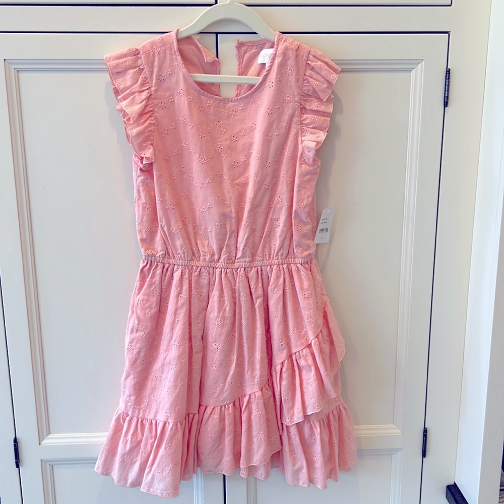 Girls BCBG size 12 dress. Cinch waste. Sleeveless flutter sleeve. NWT. Coral